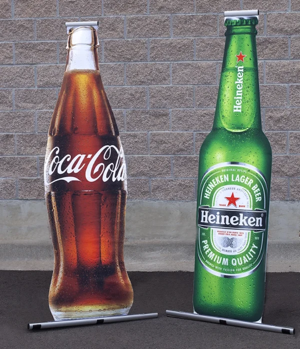 Custom Shaped Ex-T Banner Stand shaped like Coke and Heineken bottles.