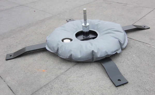 Cross Base used with a Water Weight Donut for use outside in windy situations.