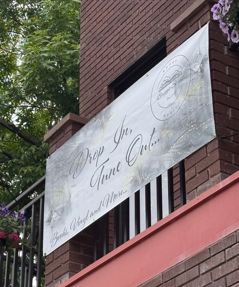 Vinyl Banners used for storefront directional signage for Briggs Street Books.