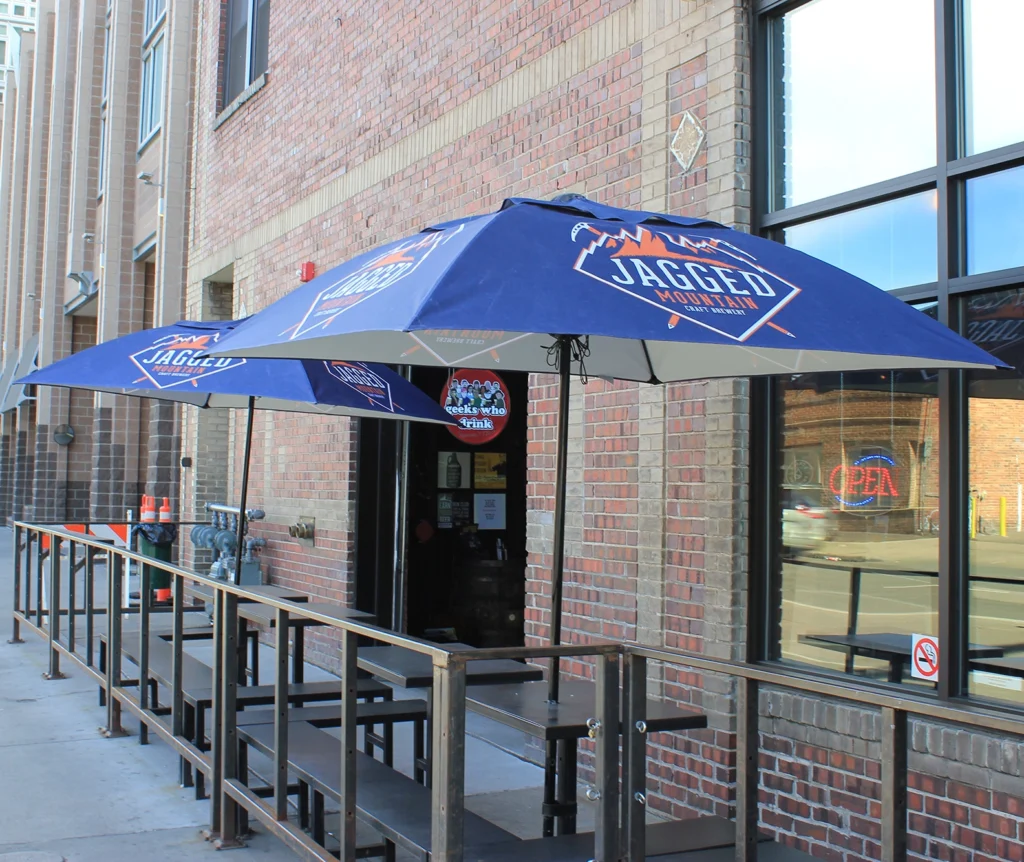 Market Umbrellas used on the patio for shade at Jagged Mountain Brewery in Denver, Colorado.