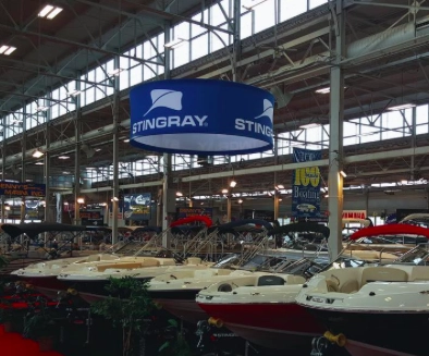 Hanging Circle Banner used over Sting Ray Boats booth at boat show