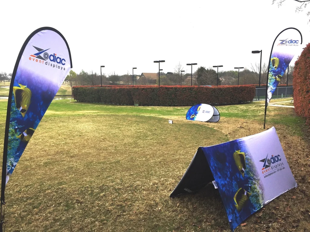 Zodiac Ex-Up Banner used for sponsorship at golf tournament.