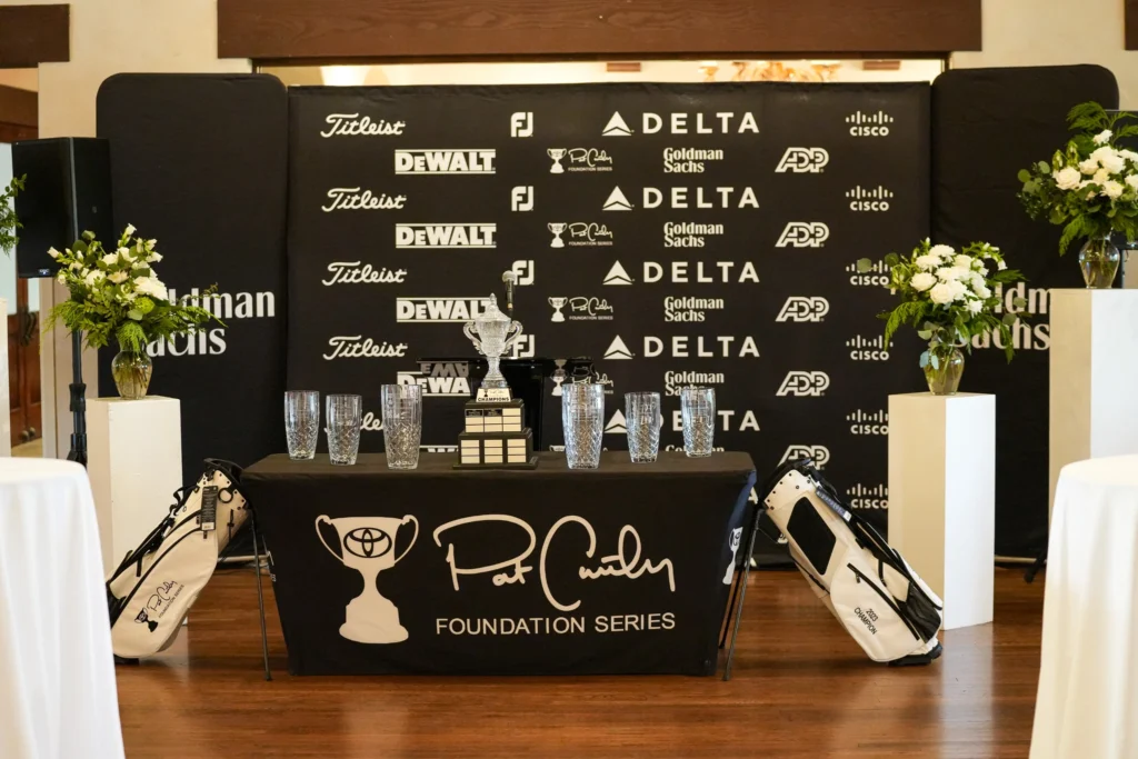 Stretch Tablecloth and Adjustable Back wall used for golf sponsors at golf event.