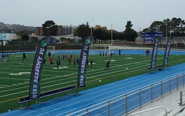 Wing banners used at Star Academy Soccer event.