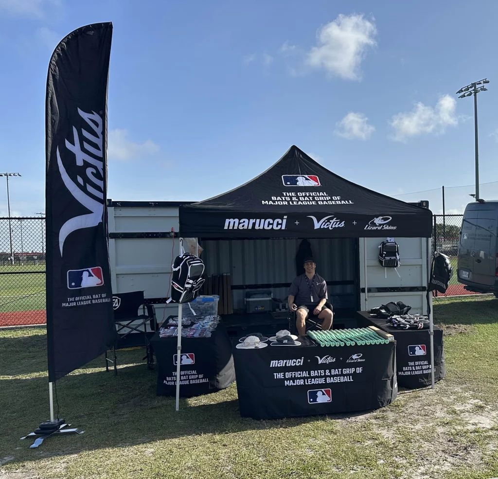 Wing Banner, pop-up tent and fitted tablecloth used at Marucci baseball event.