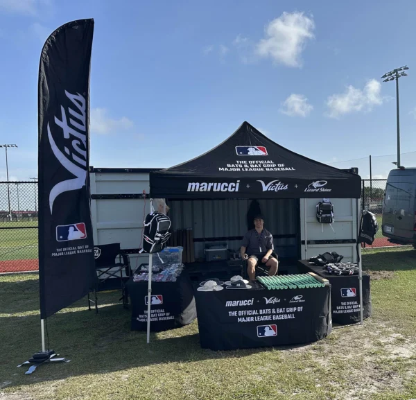 Wing Banner, pop-up tent and fitted tablecloth used at Marucci baseball event.